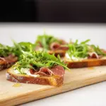 Prosciutto Arugula Bruschetta